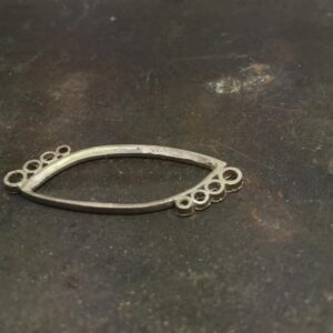 Collets for diamonds are soldered to the bezel