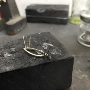 Claw wires are added to form the gallery
